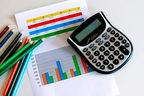 Statistical graph with calculator Stock Photos