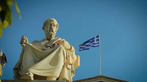 Statue of the Ancient Great Philosopher Plato Background of the Greek Flag Video stock 73900954