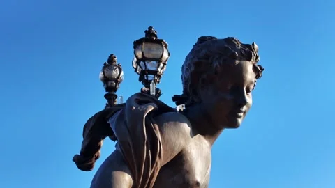 Statue and lamp post on Pont Alexandre III Paris Stock Footage 334650618