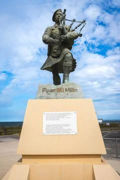 Statue and memorial for Piper Bill Millin. At Sword beach, normandy, France Stock Photos