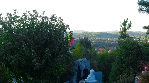 Statue and Romanian flag Stock Footage 103140432