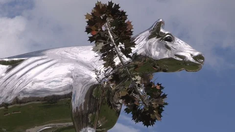 Statue and sculpture of a dairy cow in residential neighborhood in Markham Stock Footage