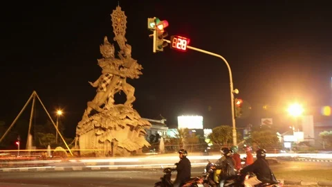 Statue and Traffic in Bali Time Lapse Stock Footage 105865614
