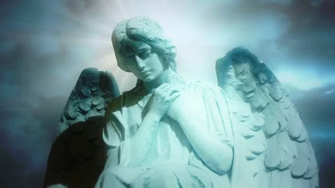 The statue of an Angel on time lapse blue clouds - Angel 1003 Stock Footage