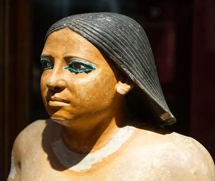 Statue of an anonymous seated Scribe. Stock Photos