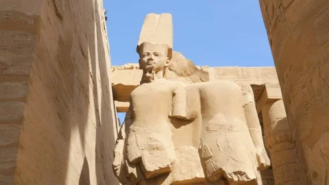 Statue Between The Destroyed Buildings Stock Footage 128040576