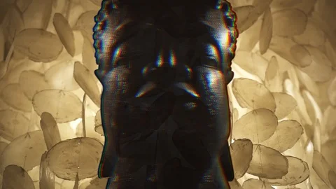 Statue of big stone Buddha head crying zooming in with glitch effect Stock-Footage 103483431