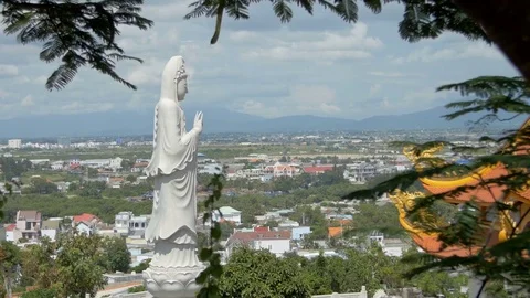 The statue of the big white Buddha in the middle of the city Stock Footage 73566980