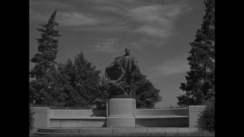 Statue of Booker T. Washington on the campus of Tuskegee University - 1940 Stock Footage 101729386