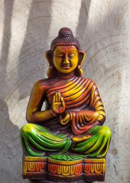 Statue of Buddha on abstract background Stock Photos