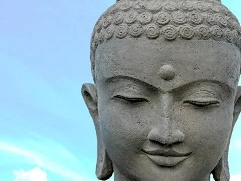 Statue of Buddha, close up of the face Photos