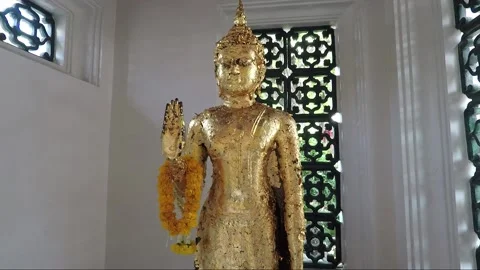 Statue of Buddha covered with gold leaf, Buddhist Temple, Bangkok, Thailand Stock Footage 161543441