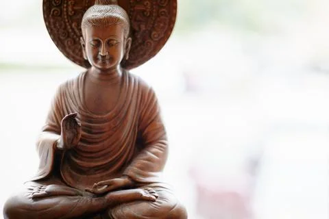 Statue, Buddha icon and empty room for worship, faith or sculpture in yoga .. Stock Photos