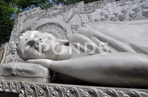 Statue of Buddha is lying to the nirvana Stock Photos