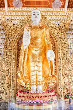 Statue in buddhist temple Stock Photos