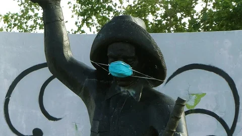 Statue of The Cane Man with a Mask On Stock Footage 130026543