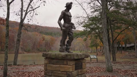 Statue CCC in Devil's Den State Park Cascade Autumn Fall Foliage Arkansas Video stock 220757221