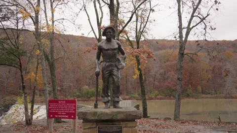 Statue CCC in Devil's Den State Park Cascade Autumn Fall Foliage Arkansas Video stock 220757255