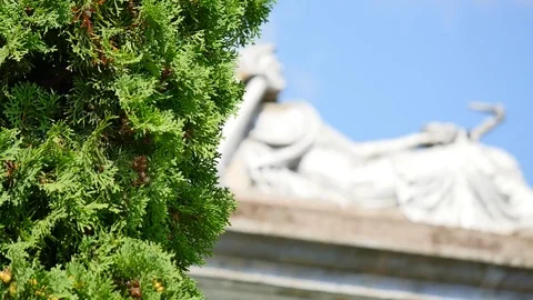 Statue in a cemetery with clouds Stock Footage
