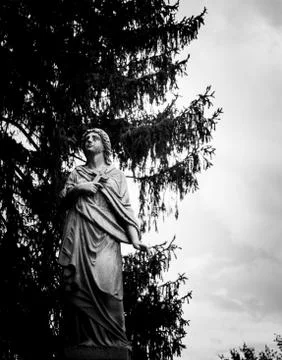 Statue in cemetery Stock Photos
