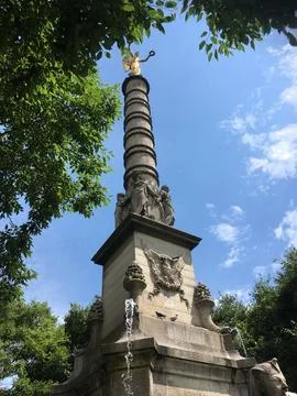 Statue on a column in a square in Paris Stock Photos