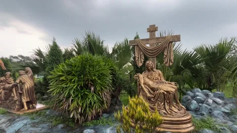A statue of the crucifixion of Jesus. It is located inside Bandel Church in West Stock Footage 313502901