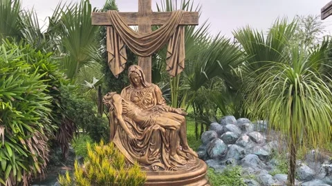 A statue of the crucifixion of Jesus. It is located inside Bandel Church in West Stock Footage 313502973