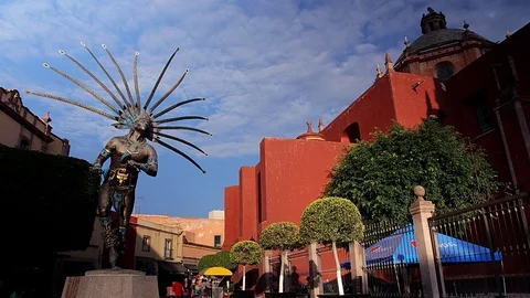 Statue of a dancing indian and facade of the church of San Francisco. Stock Footage 70823599