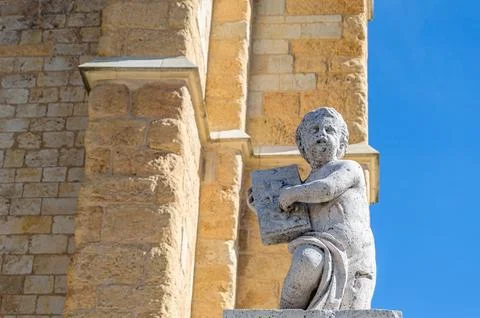 Statue decorating the facade of the Leon cathedral, Spain Stock Photos