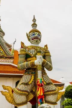 Statue of Demon Guard at Buddhist Temple. Stock Photos