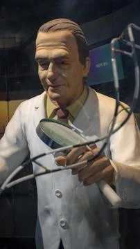 A statue of doctor doing experiment Stock Photos