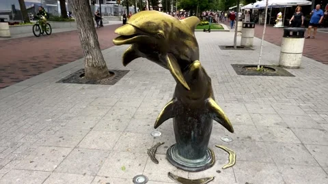 A Statue Of Dolphins Jumping Out Of The Ground. Stock Footage 149697539