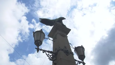 Statue of an eagle with clouds timelapse Stock Footage 188195311
