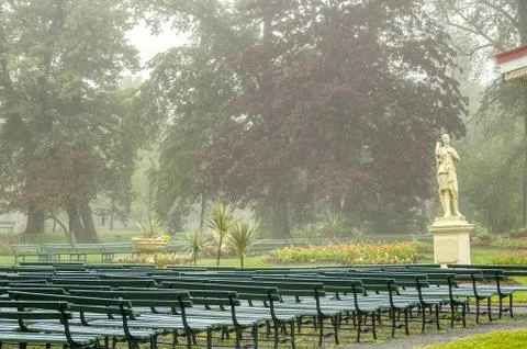 Statue with an empty audience in a park in Halifax, Nova Scotia on a misty day Stock Photos