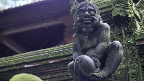 Statue of an evil monkey in the forest Stock Footage 229825531