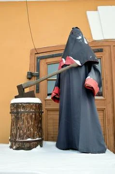 Statue of executioner with scaffold and axe. Stock Photos