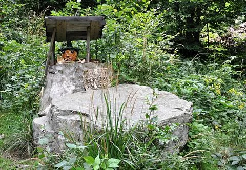 Statue in forest Stock Photos