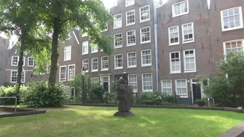 A statue in front of a building Stock Footage 94624235