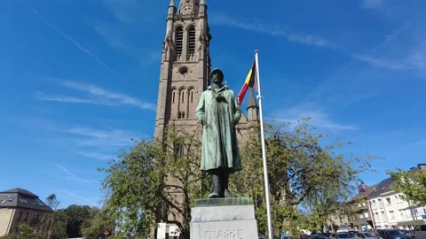 Statue in front of Eglise Saint Martin, Arlons Stock Footage 228944993