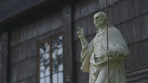 Statue in front of Saint Leonard's Church, Lipnica Murowana, Poland Stockbeeldmateriaal 73484014