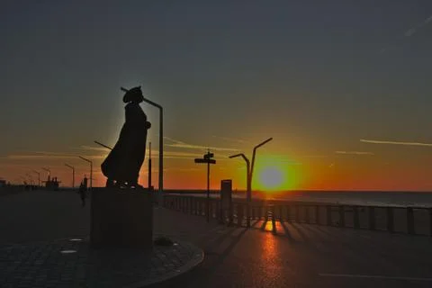 A statue in front of the sunset Stock Photos
