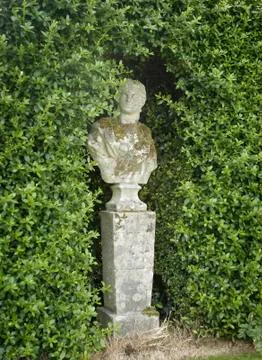 Statue in garden Stock Photos