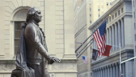 The Statue of George Washington on Wall St in the financial district of Stock Footage 138535541