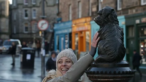 Statue of Greyfriar's Bobby on George IV bridge in Edinburgh, Scotland Stock Footage 98976350
