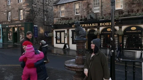 Statue of Greyfriar's Bobby on George IV bridge in Edinburgh, Scotland Stock Footage 98976738