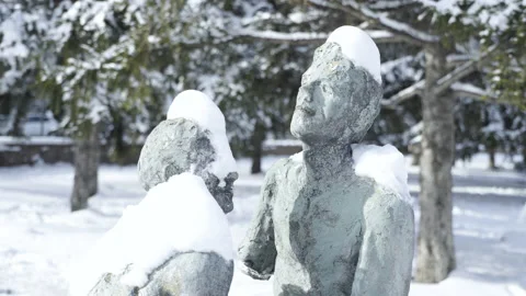Statue of human with covered snow on Stock Footage 166457338