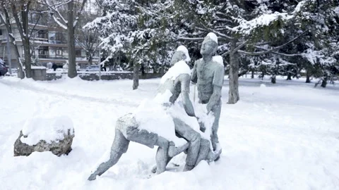 Statue of human with covered snow, people playing statue Stock Footage 166457532