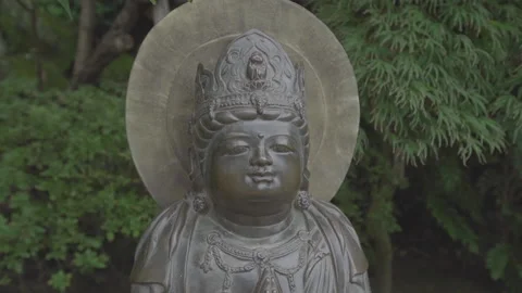 Statue in japan standing in a park Stock Footage 130202483