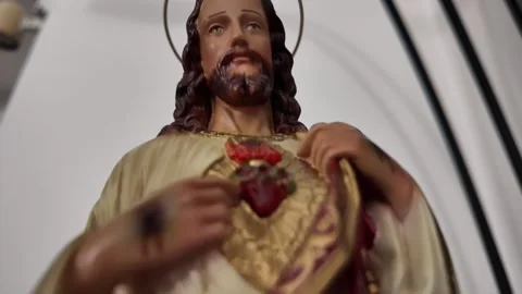 Statue of Jesus Christ inside of a small chapel in a Church Stock Footage 317178297