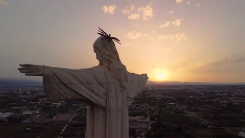 Statue of Jesus Christ Next to the sun at sunset.Cristo de Monteagudo, Murcia Stock Footage 222009389